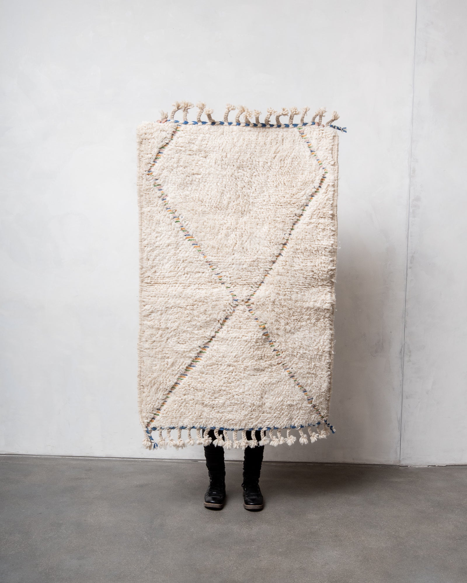 Modern, designer, handcrafted Berber rug from Morocco. Beniourain carpet with beautiful colours and patterns and fluffy wool texture.